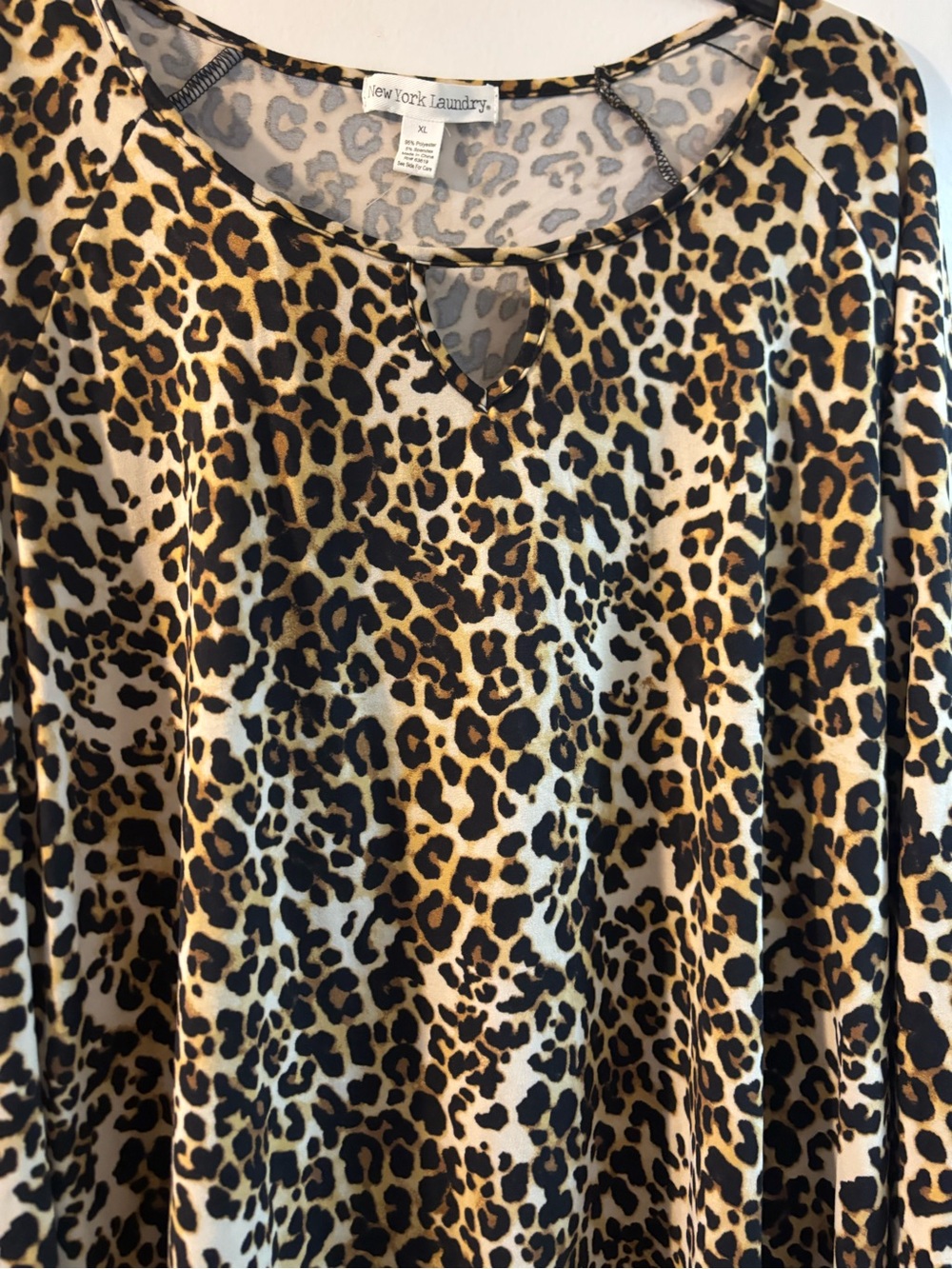 Wildly Chic & Effortlessly Sexy! Leopard print long sleeve blouse NWT